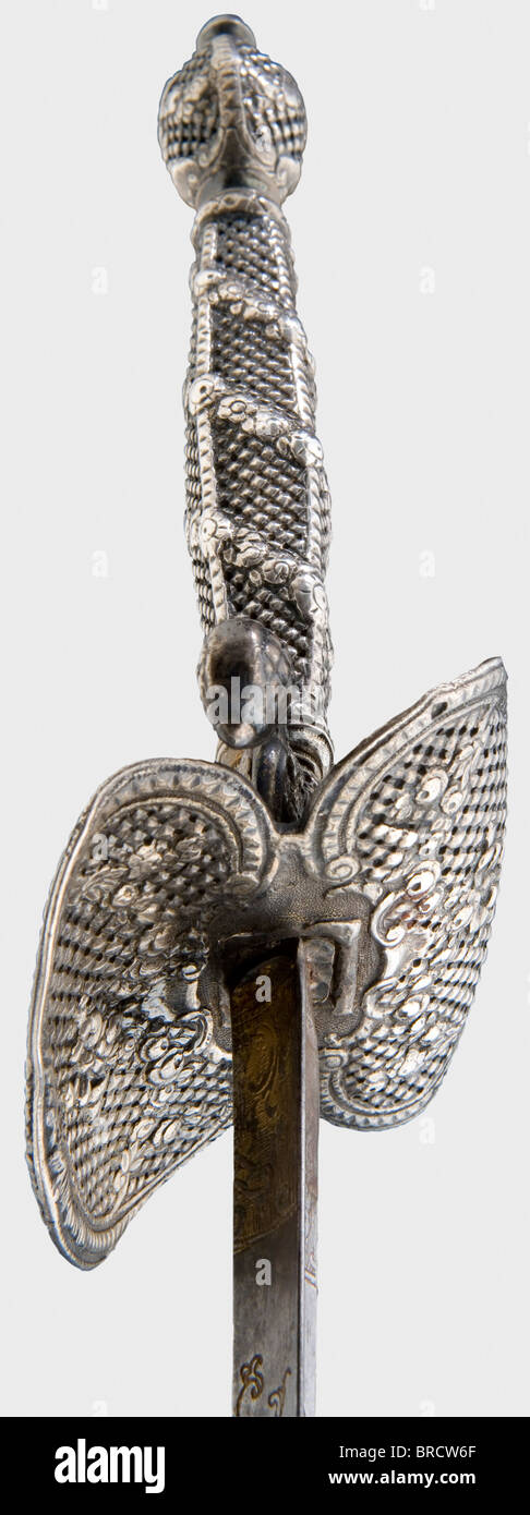 A French silver-hilted small-sword, Paris, circa 1790 Triangular thrusting blade with remnants of gilt metaphorical and ornamental etching at the forte. Fine openwork silver hilt with delicate floral relief and an S-shaped double guard. Hallmark on the arms of the hilt. Length 88.5 cm. historic, historical, 18th century, dress sword, swords, thrusting, thrustings, smallsword, epee de cour, weapon, arms, weapons, arms, military, militaria, object, objects, stills, clipping, clippings, cut out, cut-out, cut-outs, Stock Photo