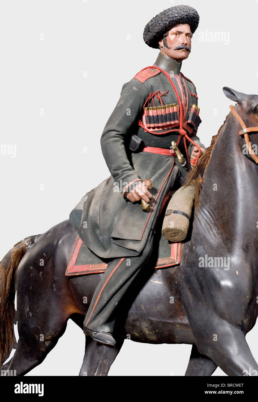 A model of a Cossack of the Caucasian Corps, Wilhelm Haasenberger, St. Petersburg, circa 1844 Plaster of Paris, hollow casting, coloured, leather, metals, horsehair and wood. Exceedingly detailed and natural presentation of a Cossack and his horse. Complete with saddlecloth, cartridge box, kinjal, pistol and mundir with gazyri on his chest. Blemishes on strapping and bridle, shashqa missing. Repaired due to old age. Height 69 cm. O historic, historical, people, 19th century, object, objects, stills, clipping, clippings, cut out, cut-out, cut-outs, sculpture, sc, Stock Photo