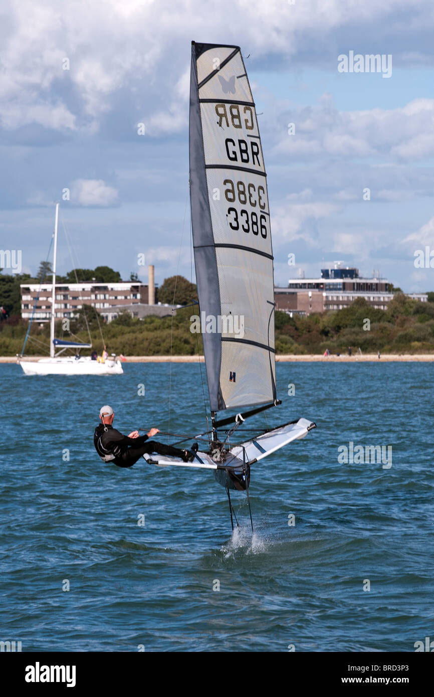 Foiling Sailing Dinghy Hydrofoil Moth Fast Speed in 10kts of wind Stock