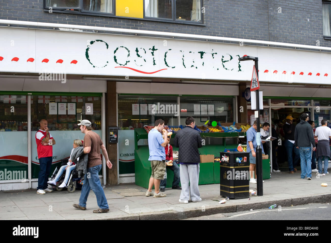 People outside Costcutter shop near Emirates stadium London Stock Photo Alamy