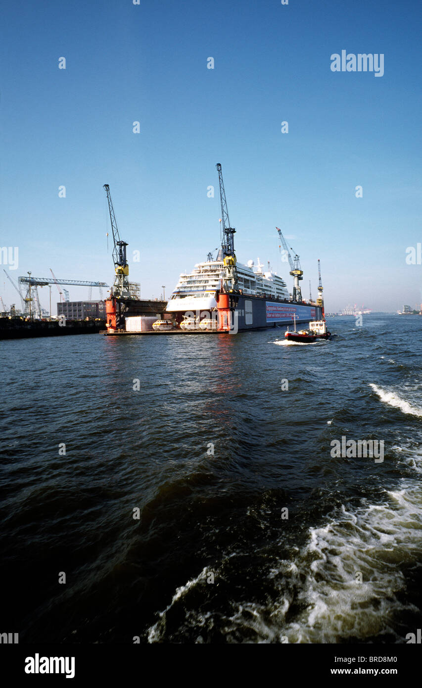 Dock 10 of Blohm+Voss ship yard in the port of Hamburg. Hapag-Lloyd owned cruise liner MS Europa is docked for maintenance. Stock Photo