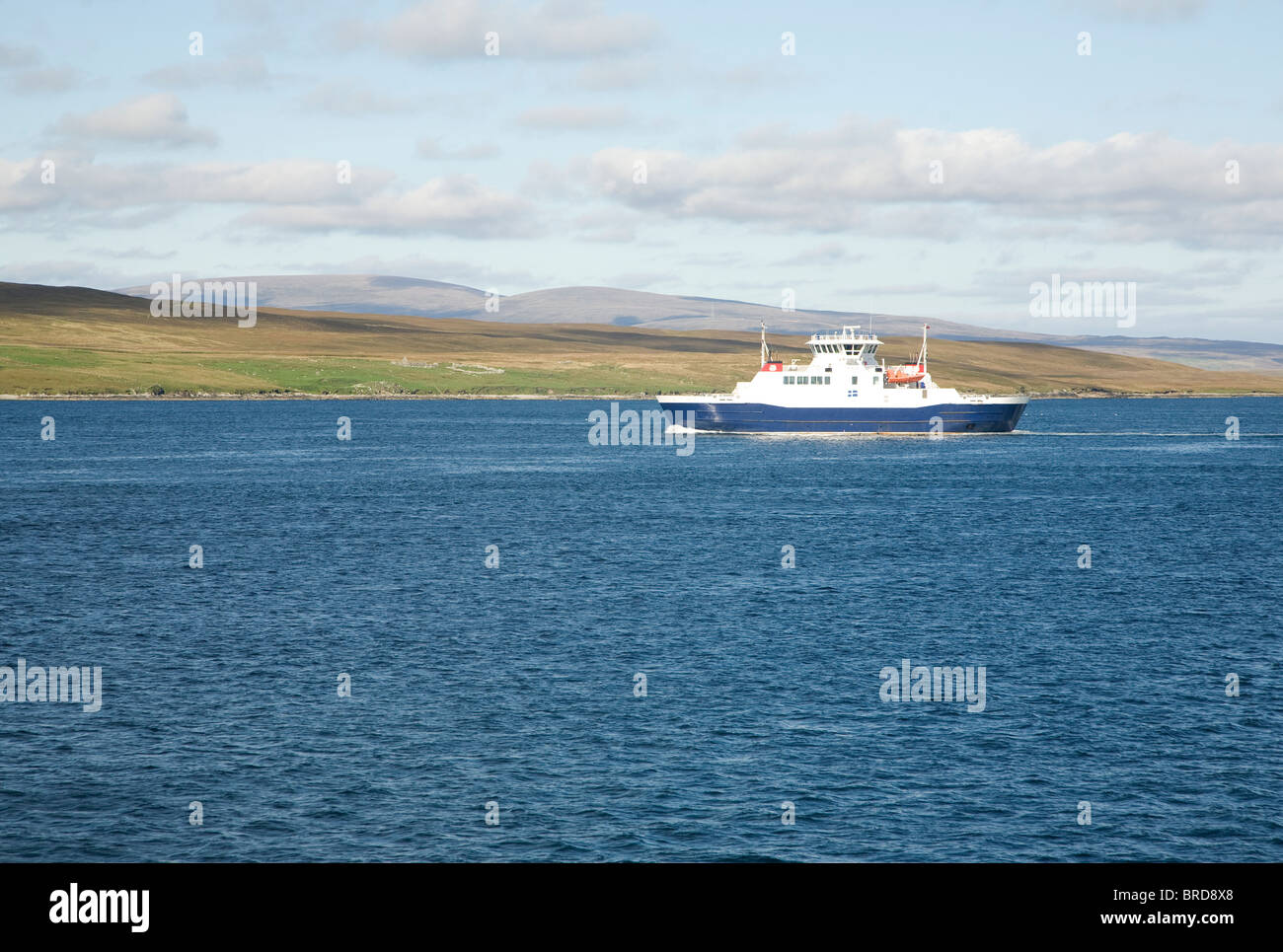 Ferry between Yell and Mainland, passing Bigga island, Shetland Islands, Scotland Stock Photo