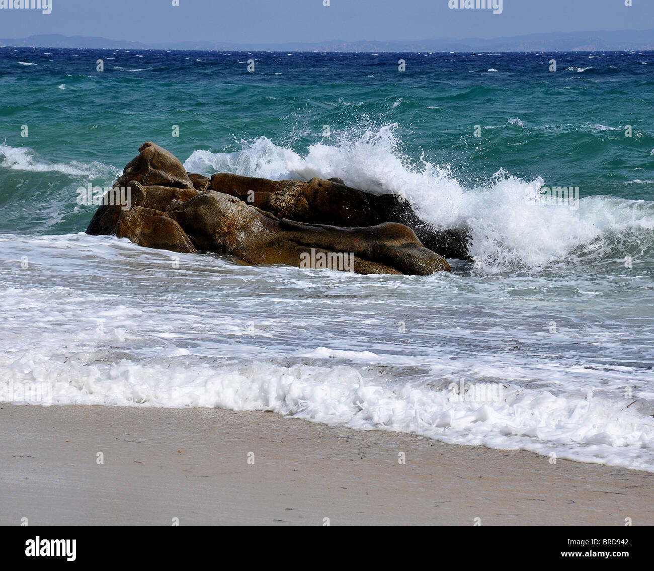 stormy sea crashing on rock Stock Photo