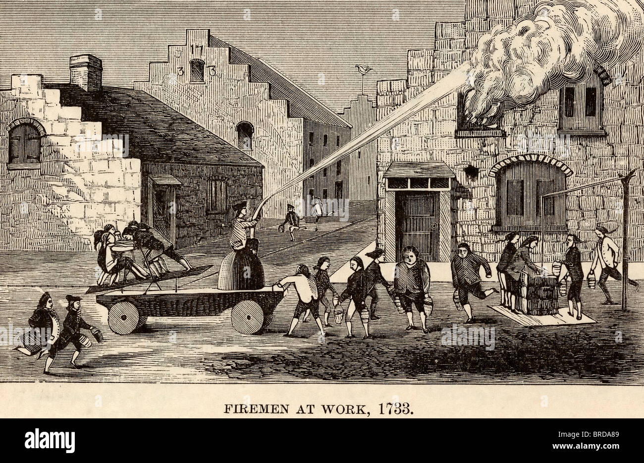 Firemen at work, 1733 (From an old Fire Certificate) Stock Photo