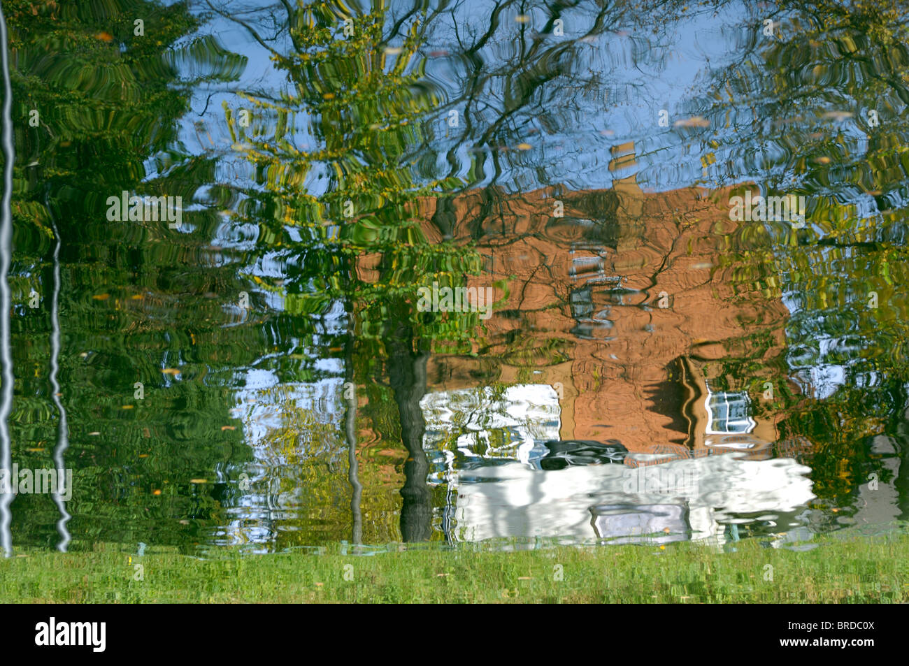 Water Reflexion of a Residential Building Stock Photo