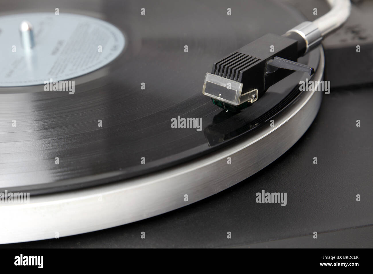 A record player is playing an album Stock Photo - Alamy