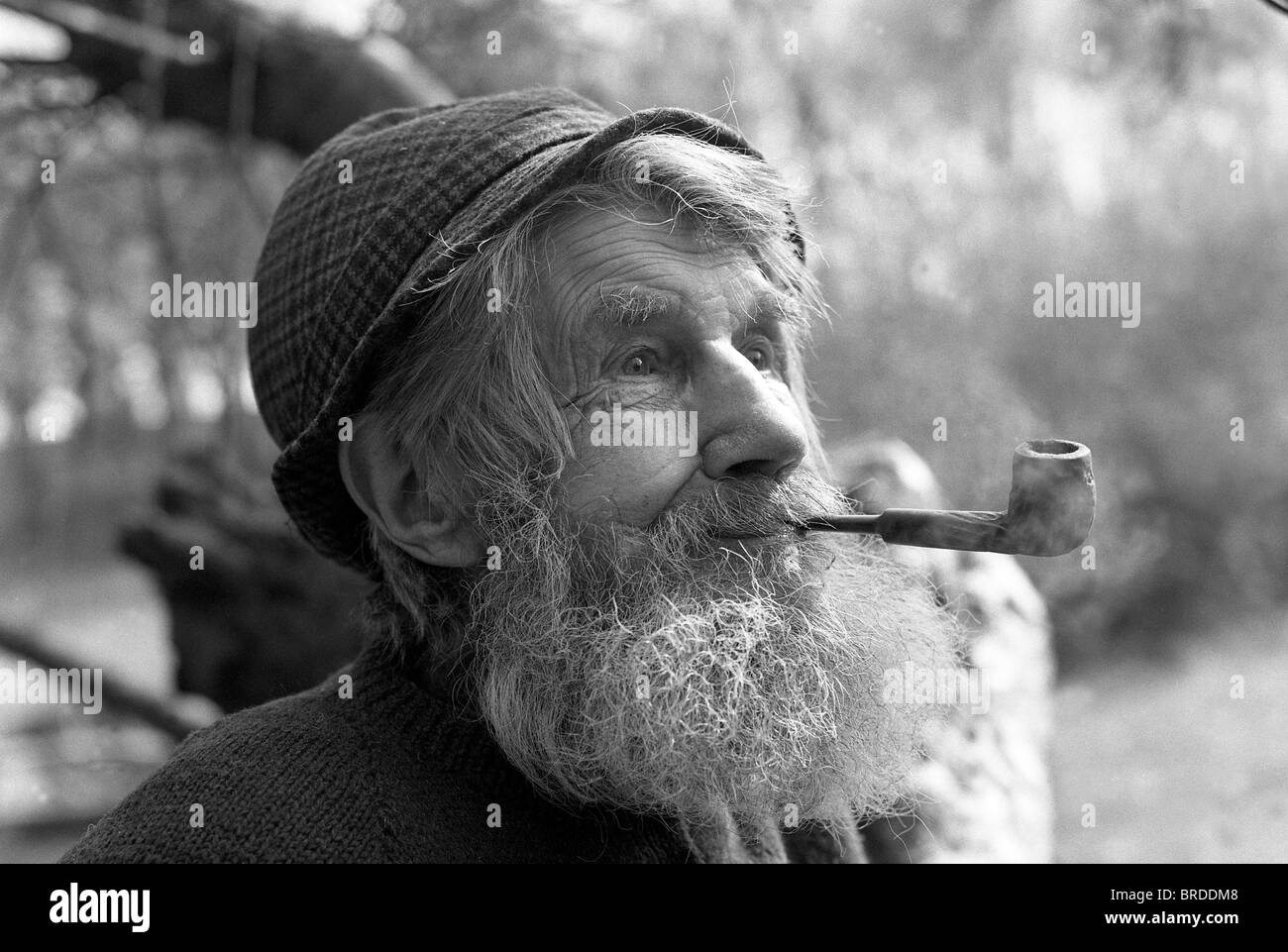 Old man called Joe Morris smoking pipe at Linley Brook near Broseley Shropshire 1973 Stock Photo