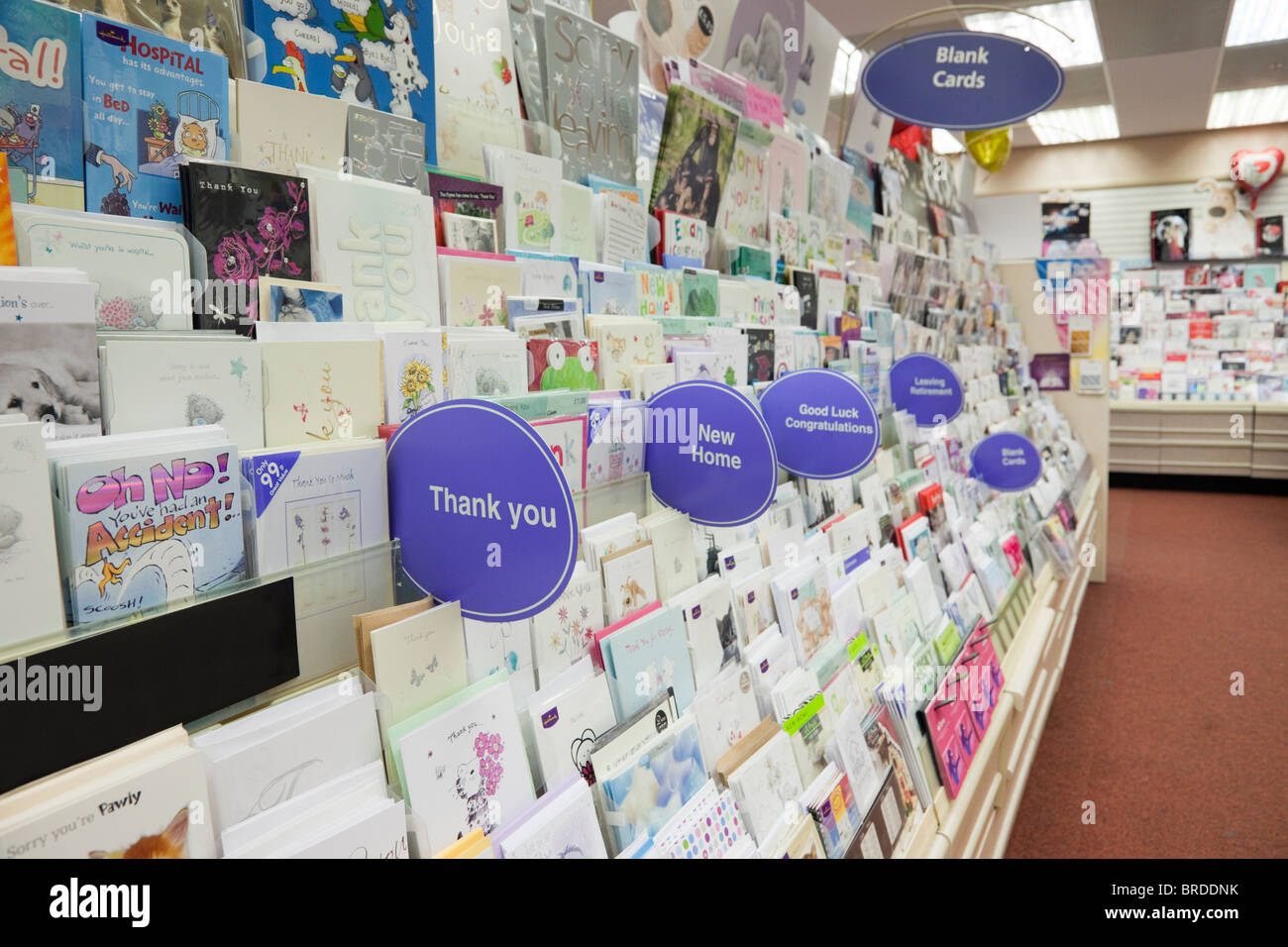 England, UK, Britain. Selection of special occasions Greeting cards for sale on a display stand inside Clintons card shop Stock Photo