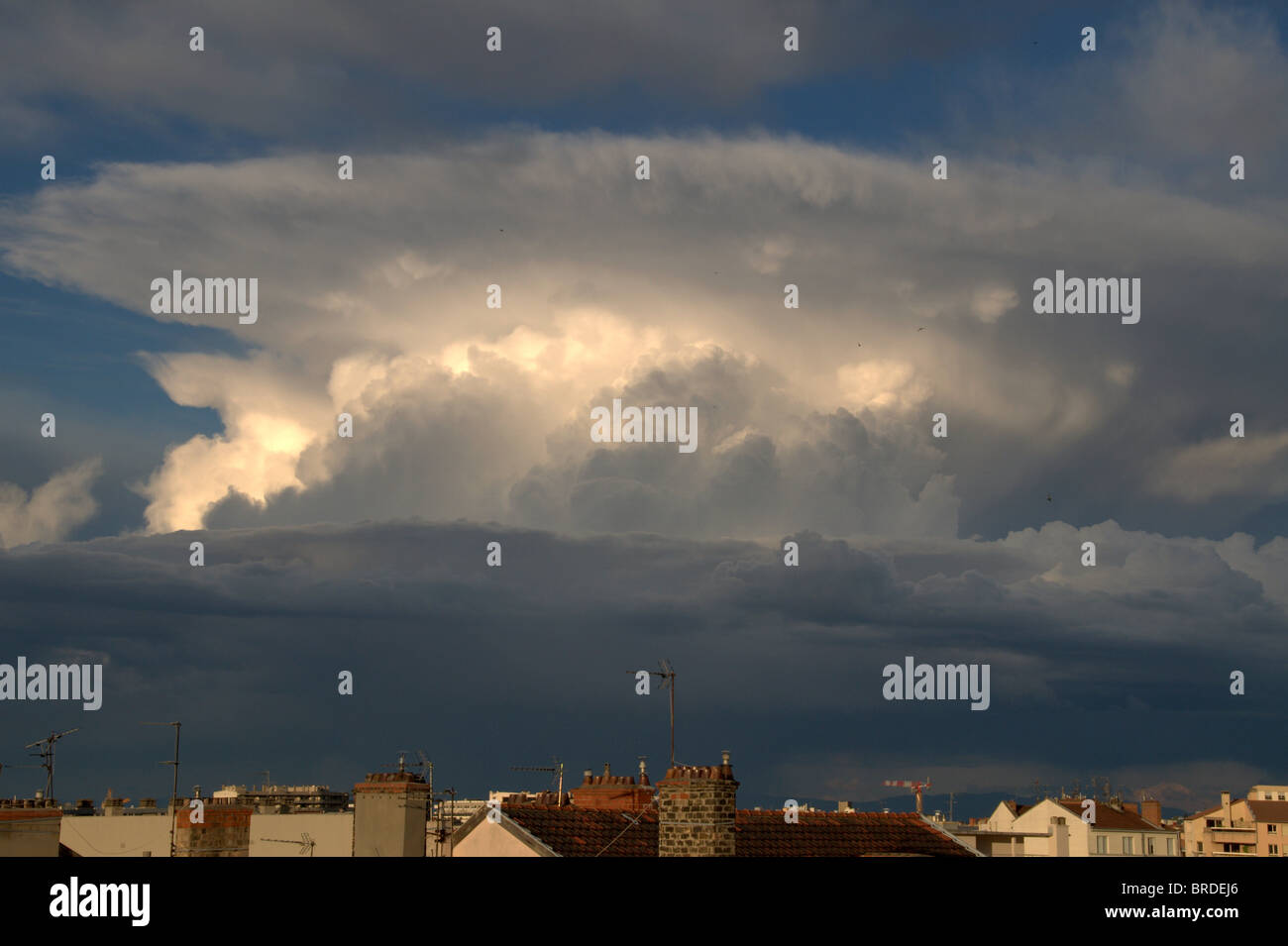 Storm cloud above the city Stock Photo