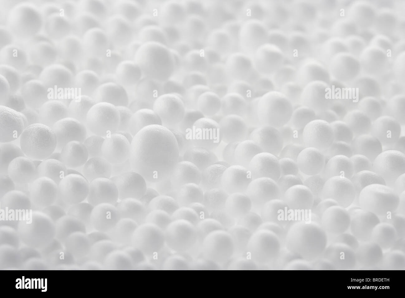 Polystyrene balls used as insulation and furniture packing filling Stock Photo