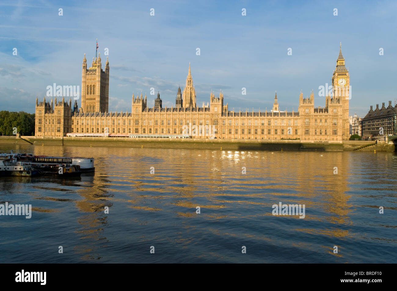 The Houses of Parliament or the Palace of Westminster next to the river Thames in London, England UK Stock Photo