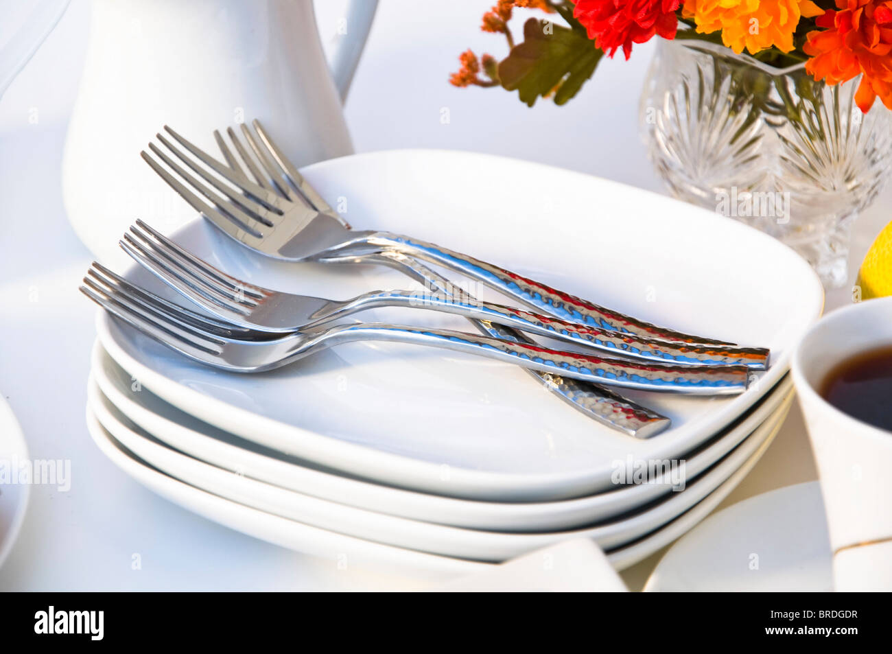 Plates and forks Stock Photo