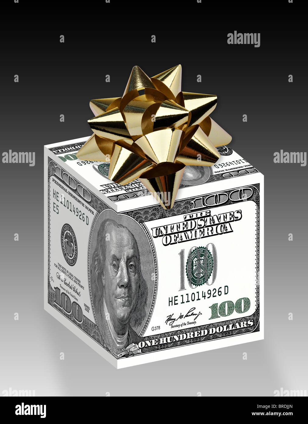 Money gift box wrapped up with $100 notes and a rosette on top. Stock Photo