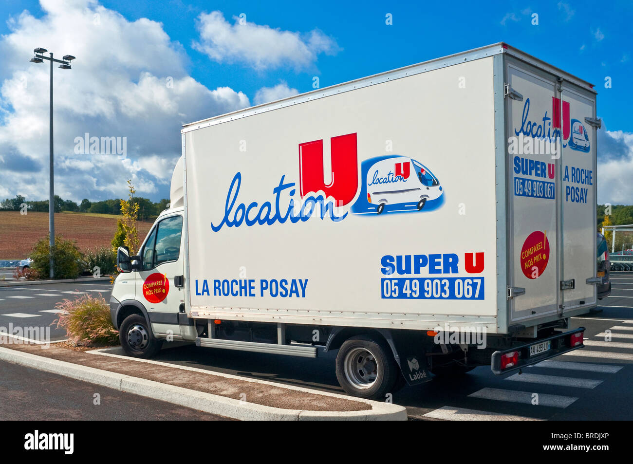Commercial transit van for hire in supermarket car-park - France. Stock Photo