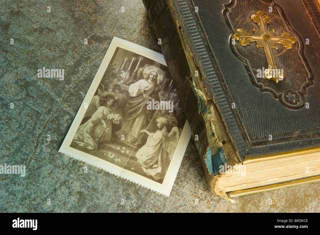 Old Bible, pictures of saints Stock Photo