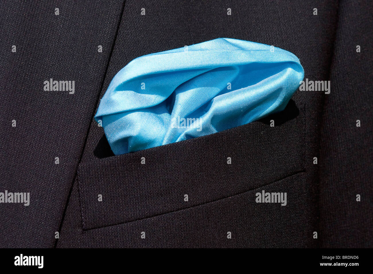 Blue handkerchief  in the pocket of the jacket worn on the day of the wedding. Stock Photo