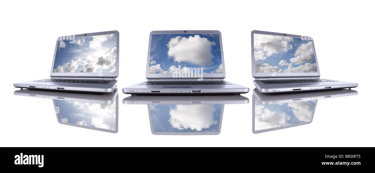 Cloud computing concept in three modern laptop isolated on white Stock Photo
