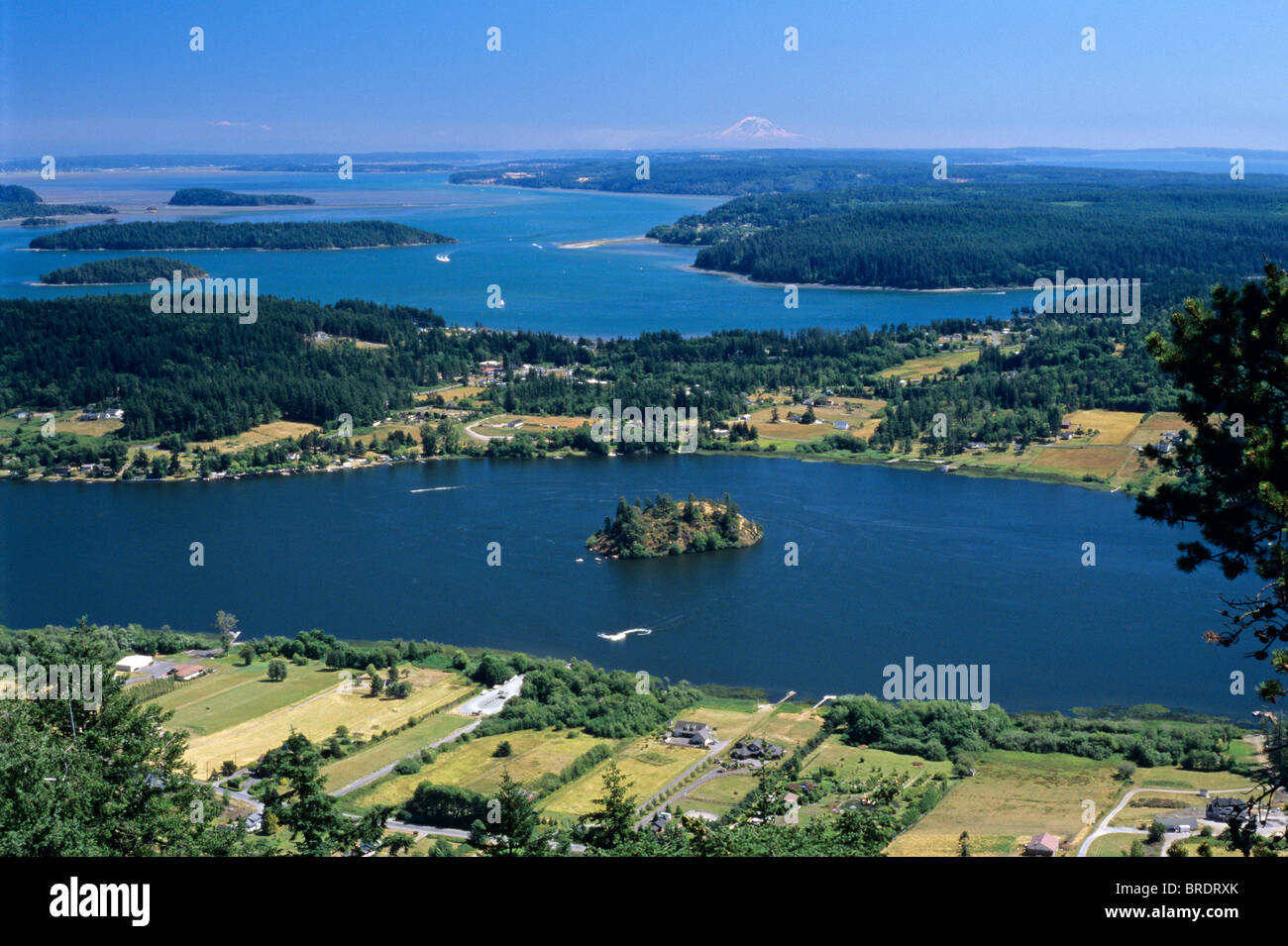 Mount Rainier from Mount Erie south Fidalgo Island with boats and homes