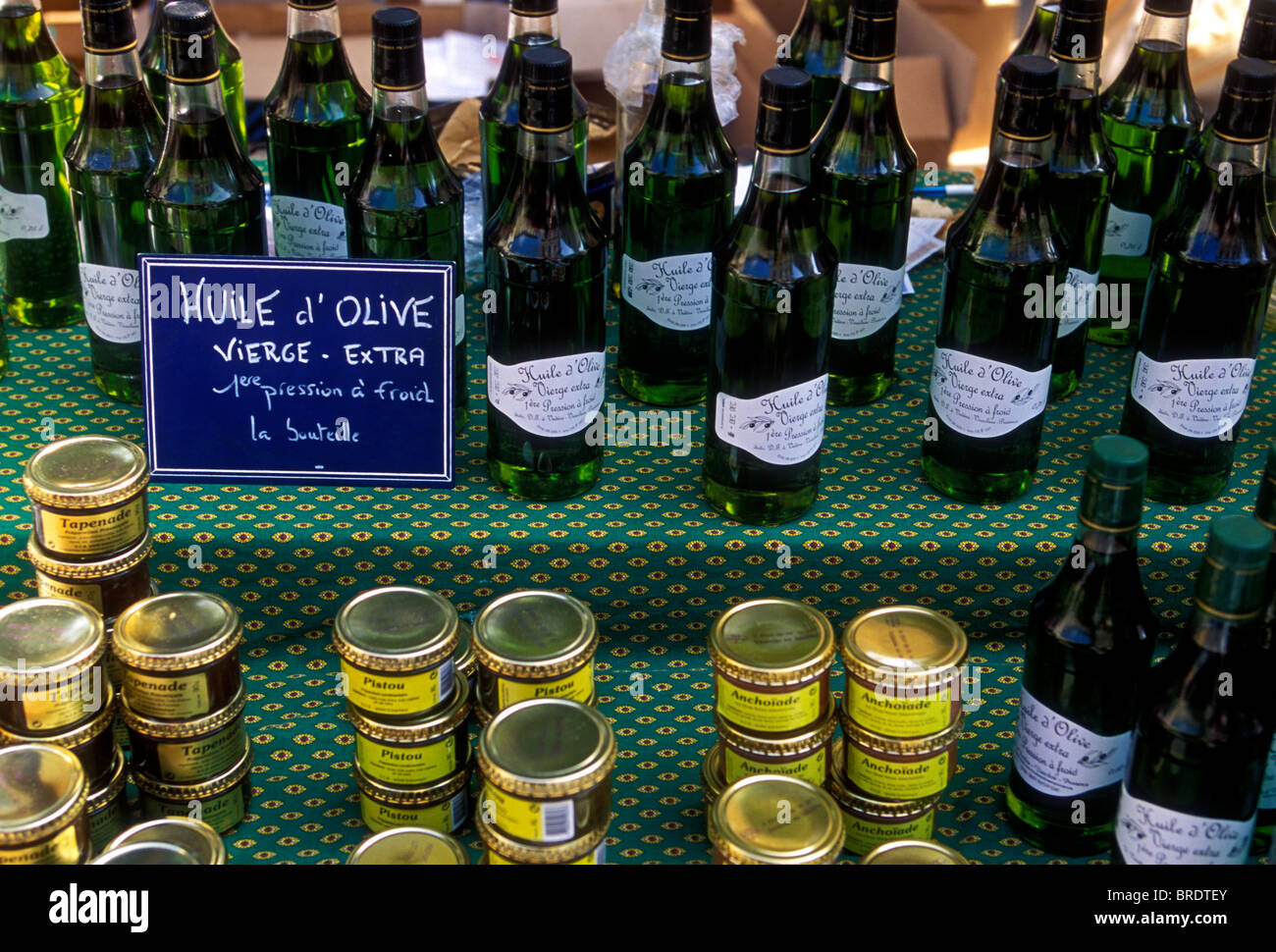 olive oil vendor, selling olive oil, olive oils, market day