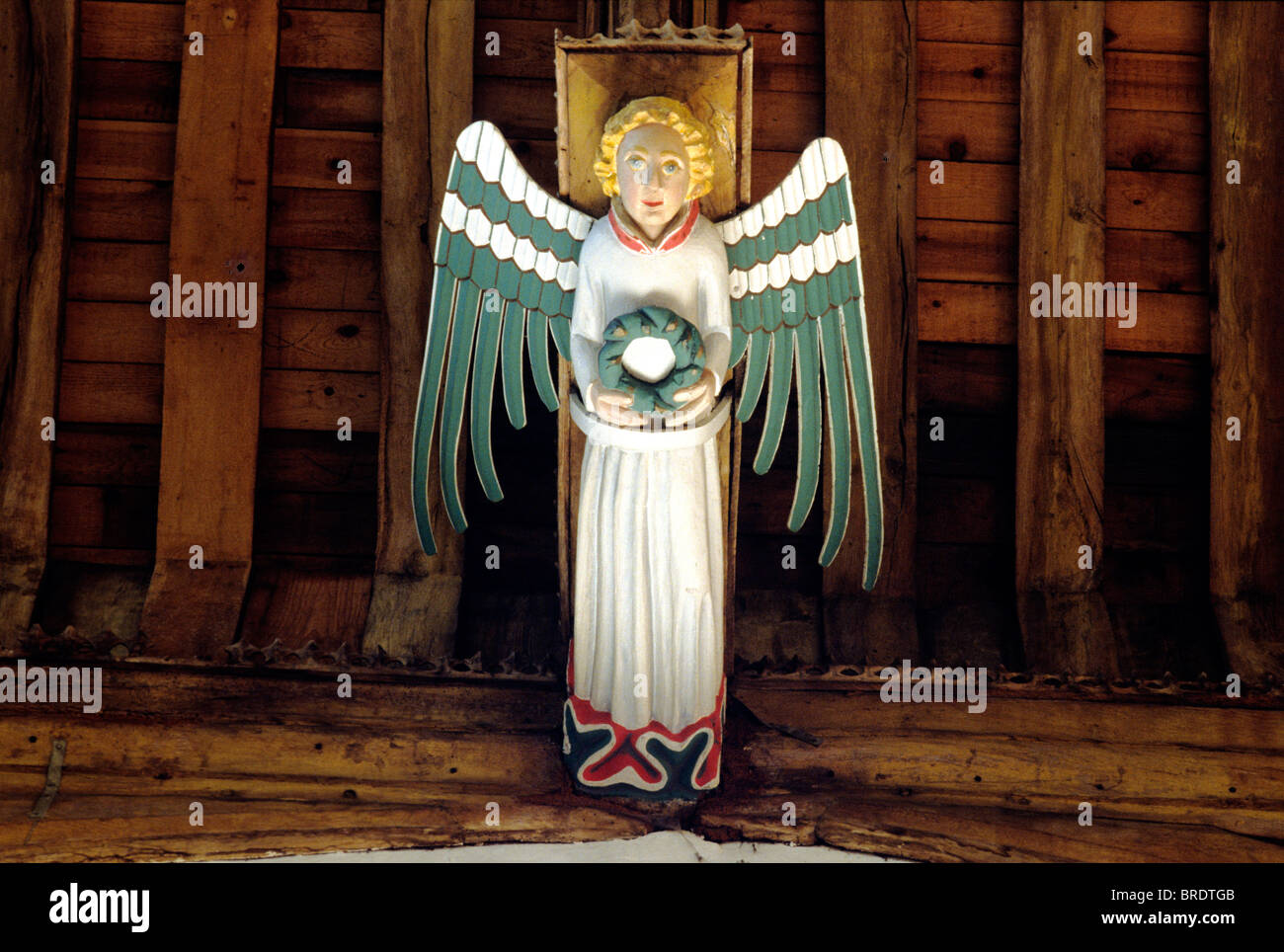 South Creake, angel on hammerbeam roof, 15th century medieval wood carving, Norfolk  England UK English carvings angels church Stock Photo