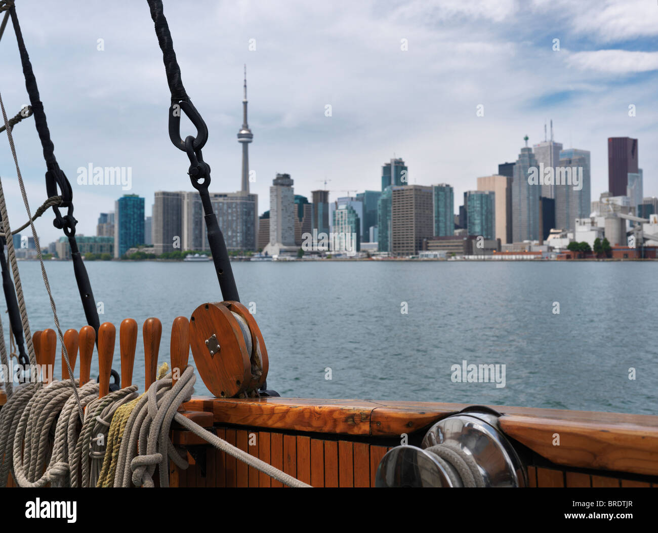 Sailing on a cruise tall ship with the city of Toronto skyline in the background. Ontario, Canada. Stock Photo