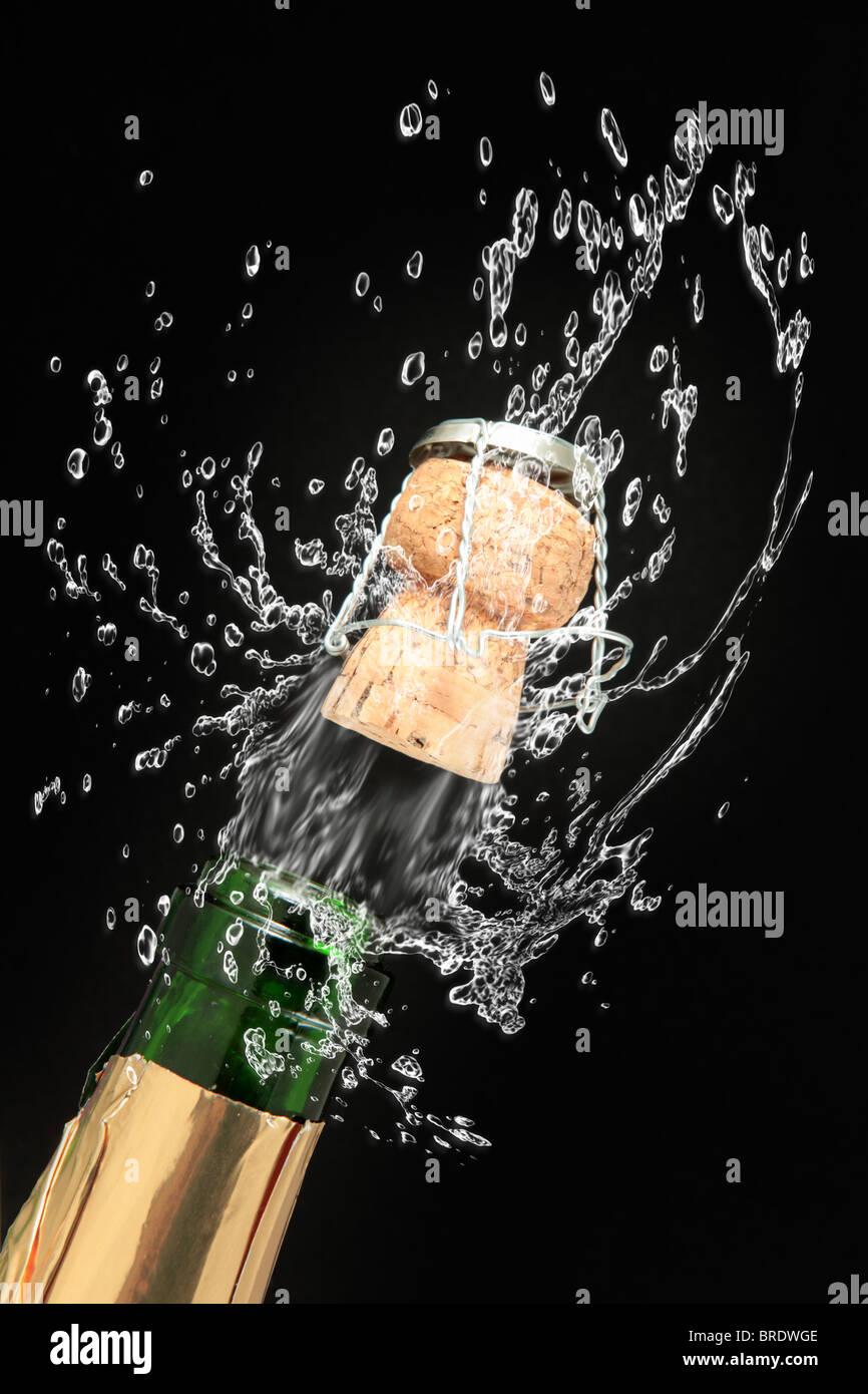 Champagne bottle cork popping Stock Photo