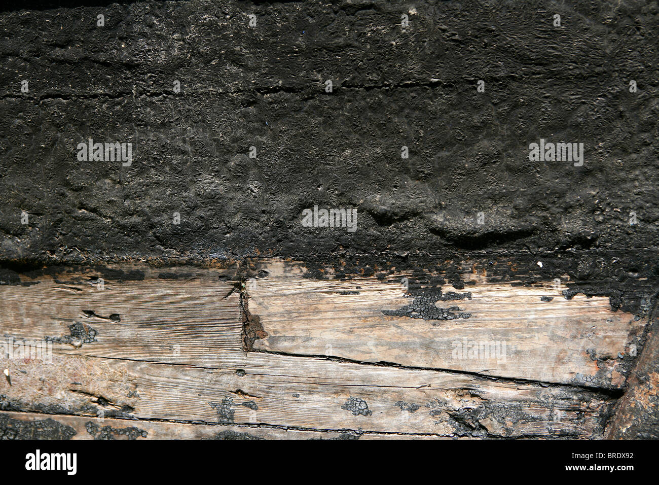 Black paint in wooden boat hull grunge aged texture Stock Photo Alamy