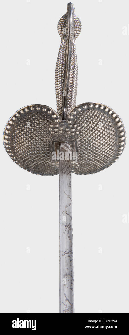 A French silver-hilted small-sword, Paris between 1781 and 1789 Hollow triangular thrusting blade with a decoratively etched forte. Fine openwork silver hilt chased with geometric relief. Hallmarks for Paris between 1781 and 1789 on the arms of the hilt and grip. Length 101 cm. historic, historical, 18th century, dress sword, swords, thrusting, thrustings, smallsword, epee de cour, weapon, arms, weapons, arms, military, militaria, object, objects, stills, clipping, clippings, cut out, cut-out, cut-outs, Stock Photo