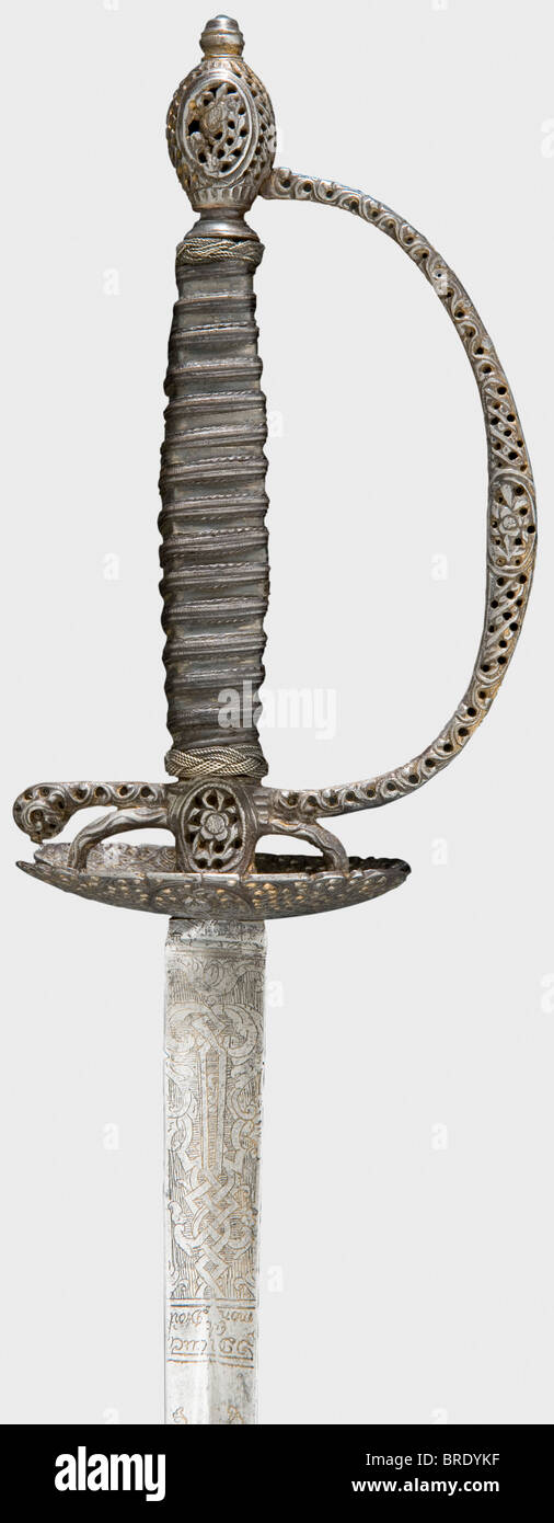 A French sword with cut-steel hilt, circa 1780 Hollow triangular thrusting blade with remnants of gilt etching. Fine openwork iron hilt chiselled in floral and geometric designs (the pommel somewhat dented on one side). Original silver wire grip cover and Turk's heads. Length 98 cm. historic, historical, 18th century, dress sword, swords, thrusting, thrustings, smallsword, epee de cour, weapon, arms, weapons, arms, military, militaria, object, objects, stills, clipping, clippings, cut out, cut-out, cut-outs, Stock Photo