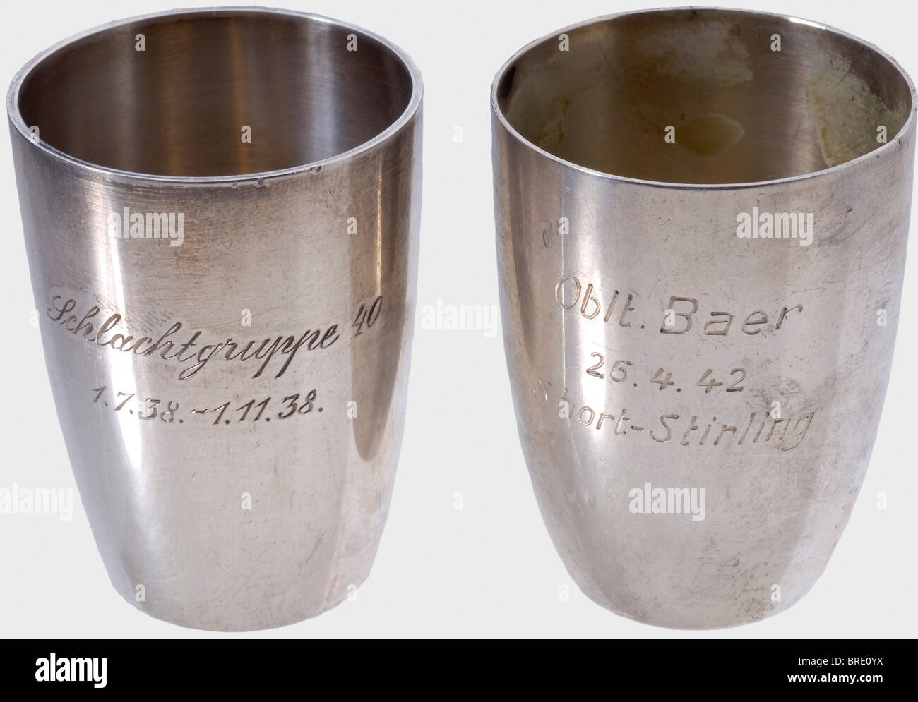 Hauptmann Baer, Commanding Officer II/NJG 5, A silver tray with eight silver beakers for night victories 1942/43 The tray with the engraved emblem of the Night Fighter Division, punched 'WTB 835'. Diameter 26.5 cm. Two of the schnapps beakers are engraved 'Olt. Baer' on the viewing side, each has a separate addendum: '26.4.42 - Short Sterling' and '29.4.42 - Vickers-Wellington'. The remaining six beakers are all engraved 'Hptm. Baer' with the addendums '20.4.43 - Lancaster' (on two beakers), '21.4.43 - Lancaster', '29.4.43 - Short Sterling', '4.7.43 - Vickers-W, Stock Photo