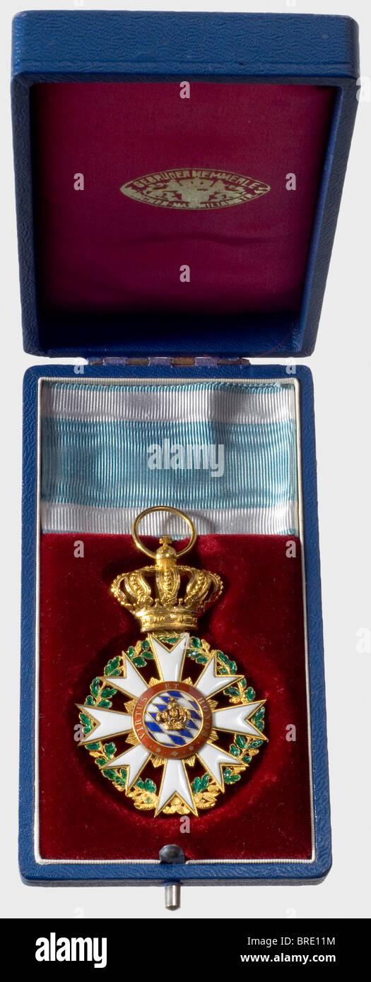 A Civil Merit Order of the Bavarian Crown, Knight's Cross, 1808 - 1918 Gold, 15.37 g, enamelled. The ring is punched 'EQ' for Eduard Quellhorst. Fine, very thin issue, included are a 15 cm ribbon section and the light blue award presentation case with dark red velvet insert and maker's mark of the Hemmerle Brothers, Munich in the liner. It was customary for returnable examples of this award by Quellhorst or Leser to arrive at the award ceremony in a case made by the Hemmerle firm. The bestowal of this order carried with it elevation to the personal nobility. hi, Stock Photo