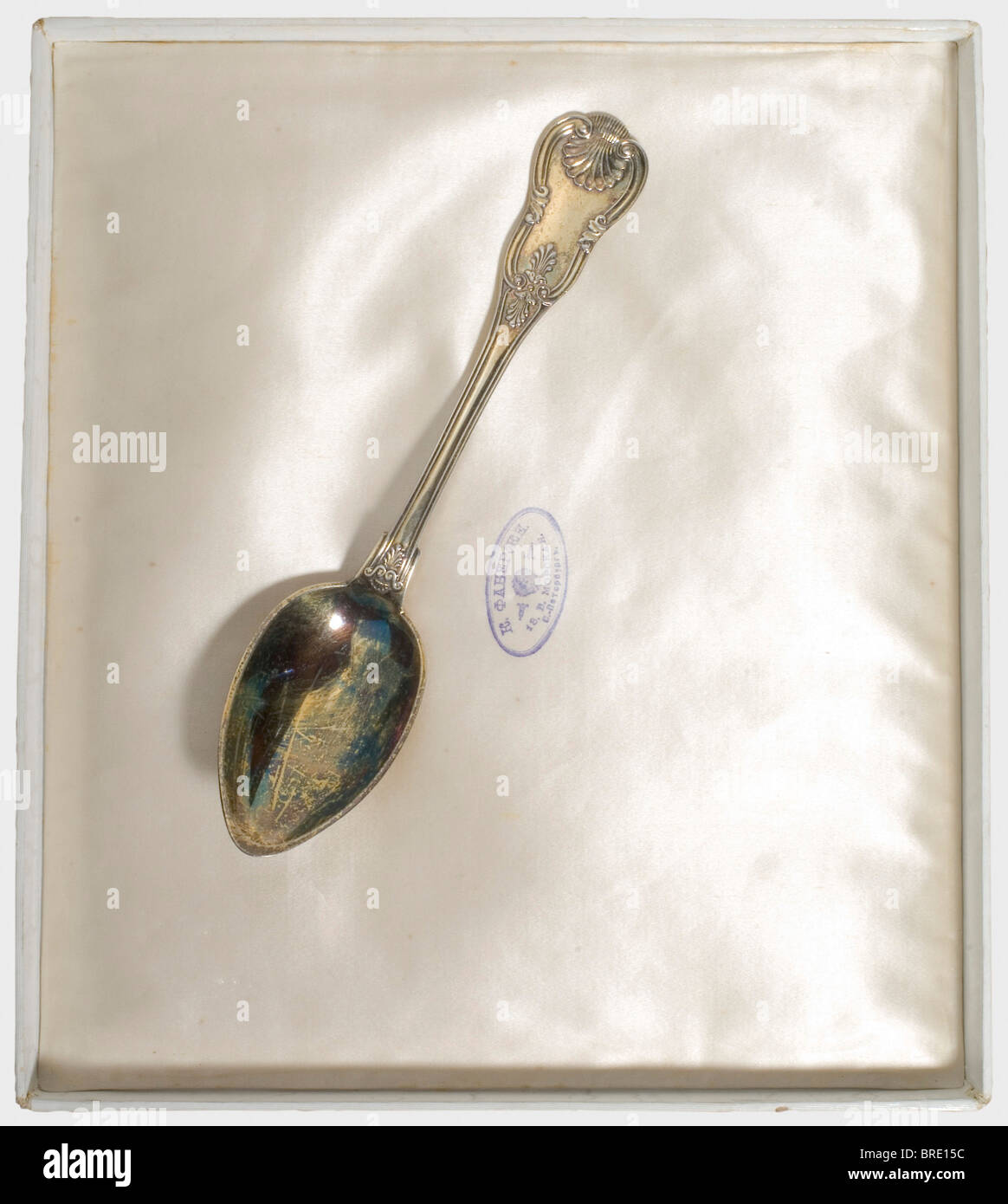 Grand Duchess Maria Nikolaevna Romanova (1819 - 1876), a vermeil spoon, France, circa 1840/50 Gilded silver, bearing a finely engraved monogram 'MN' beneath a grand ducal coronet. French export marks for the period 1840 - 1879. Length 21 cm. Weight 76 g. It comes with a cardboard Fabergé jewellry(?) box, stamped 'K. Faberge' in the silk of the lid, and with the St. Petersburg address. Dimensions 28 x 24 x 4.6 cm. Maria Nikolaevna, daughter of Tsar Nicholas I, first married Maxmilian de Beauharnais, Duke of Leuchtenberg, and then in 1856 she married Count Gregor, Stock Photo