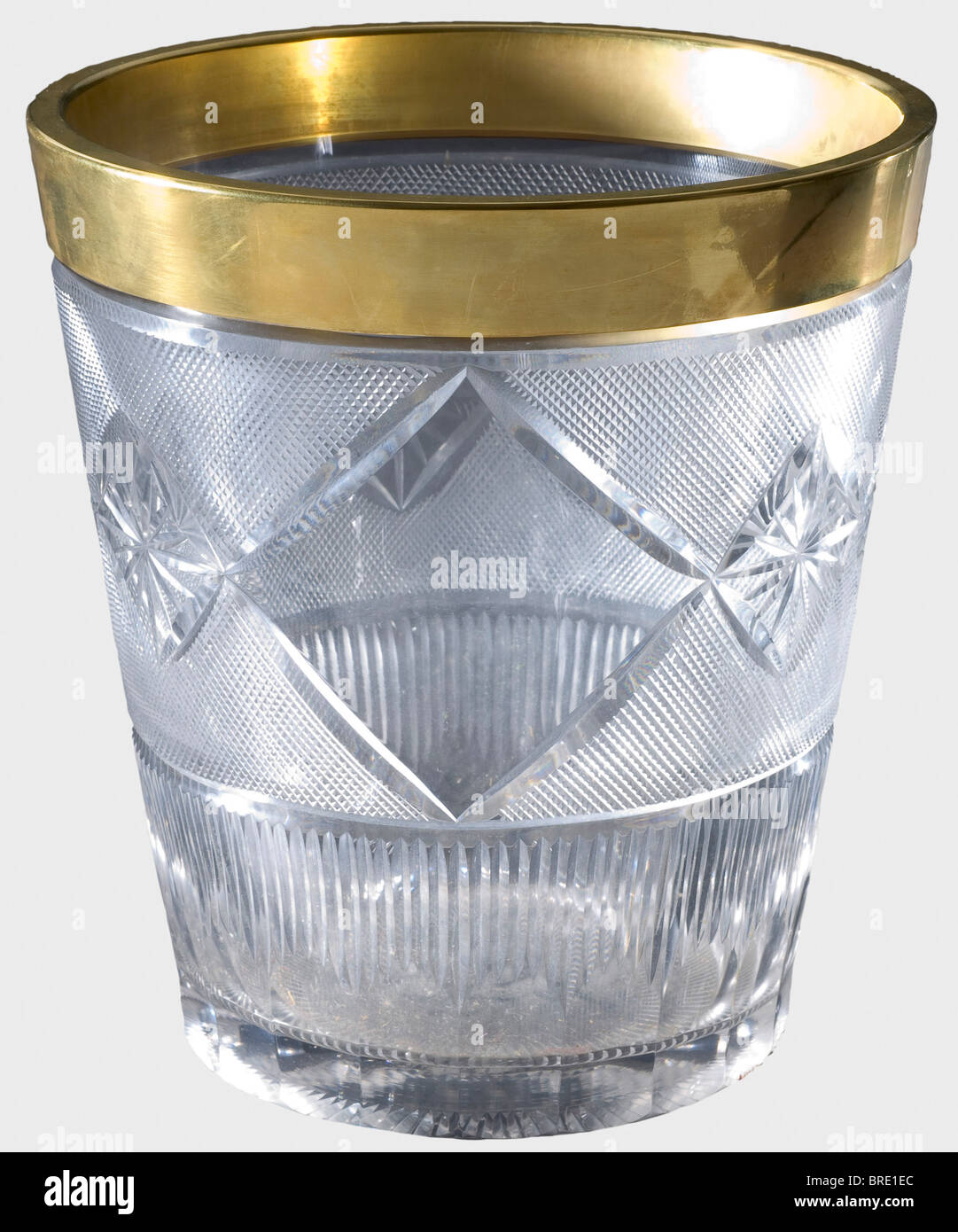 A Russian crystal glass Champagne cooler, circa 1890 Crystal glass with ground designs and diamond-cut walls. Gilded rim. Height 21.5 cm. Diameter 19.5 cm. Provenance: Grand Duchess Vera Konstantinovna Romanova (1854 - 1912). historic, historical, 19th century, vessel, vessels, object, objects, stills, clipping, clippings, cut out, cut-out, cut-outs, Stock Photo