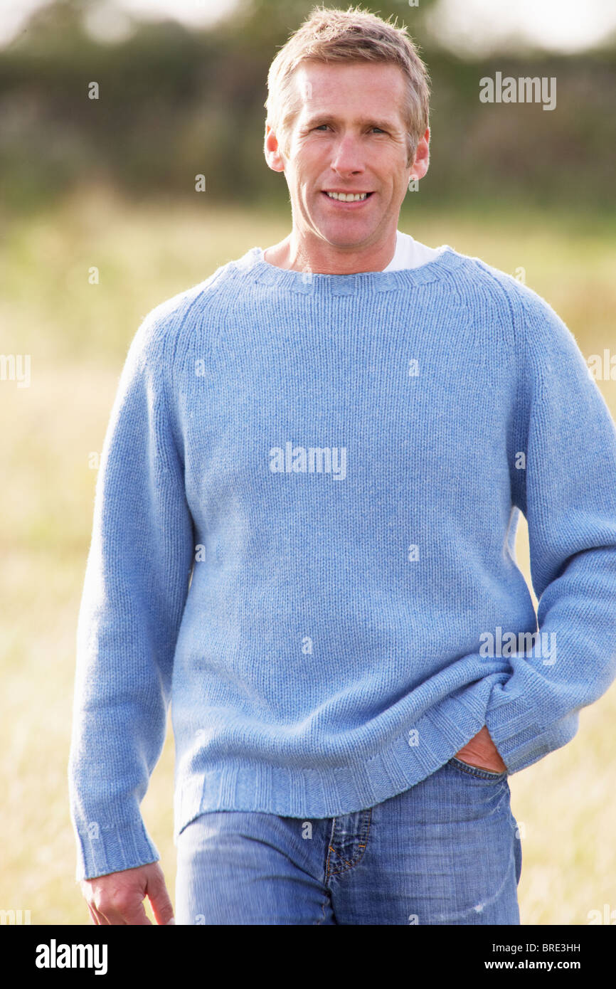 Handsome middle aged man walking hi-res stock photography and images ...