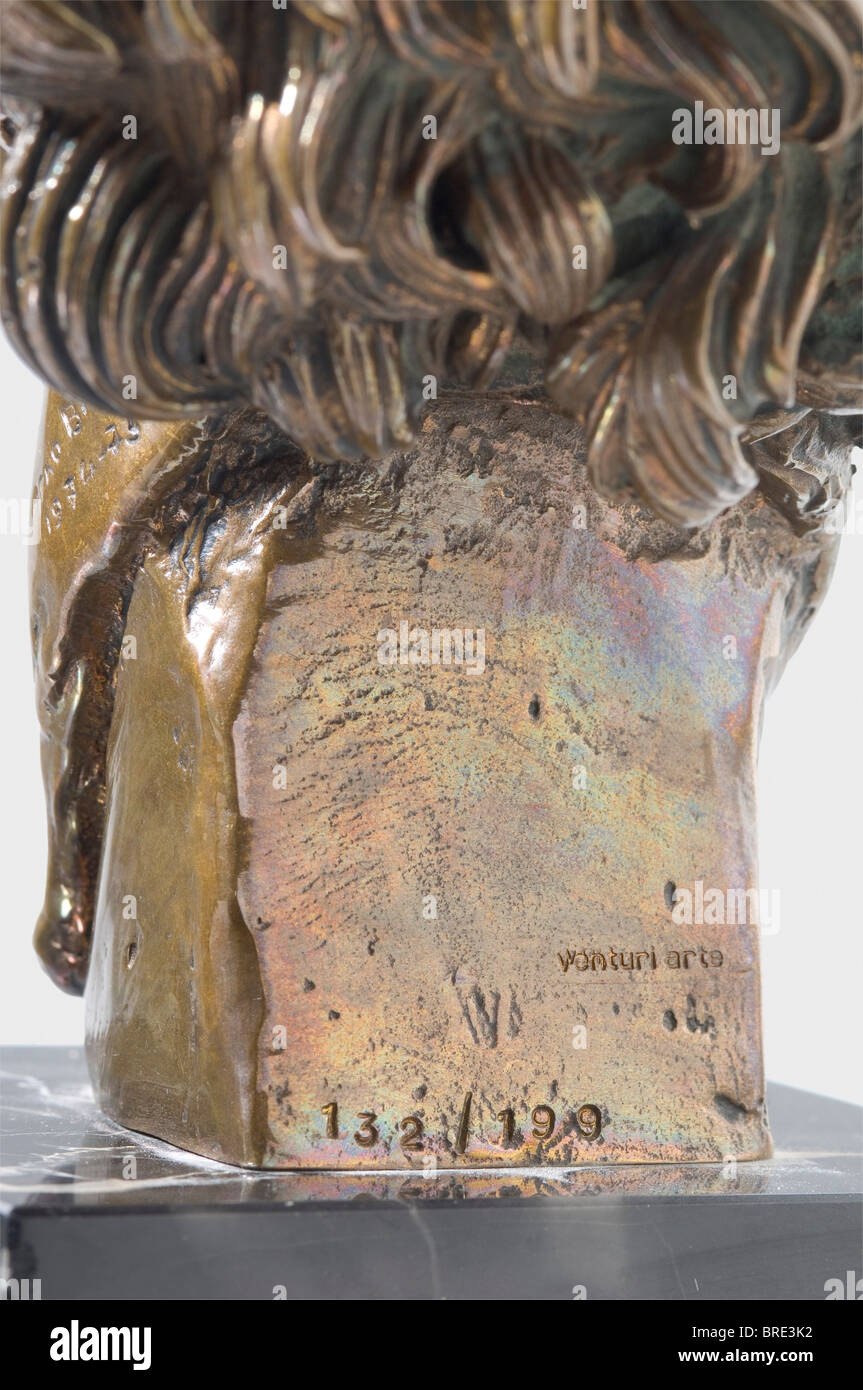 Arno Breker (1900 - 1991), a head of Salvador Dali Gilt bronze with black streaked marble base. On the left side of the neck the artist's signature and date 'Arno Breker 1974 - 75', on the back foundry stamp 'Venturi Arte' and edition number '132' (199 copies were produced in total). Height of the bronze head 21 cm, with base 29 cm. Very impressive, finely modelled head. historic, historical, 1970s, 20th century, fine arts, art, NS, National Socialism, Nazism, Third Reich, German Reich, Germany, National Socialist, Nazi, Nazi period, Stock Photo