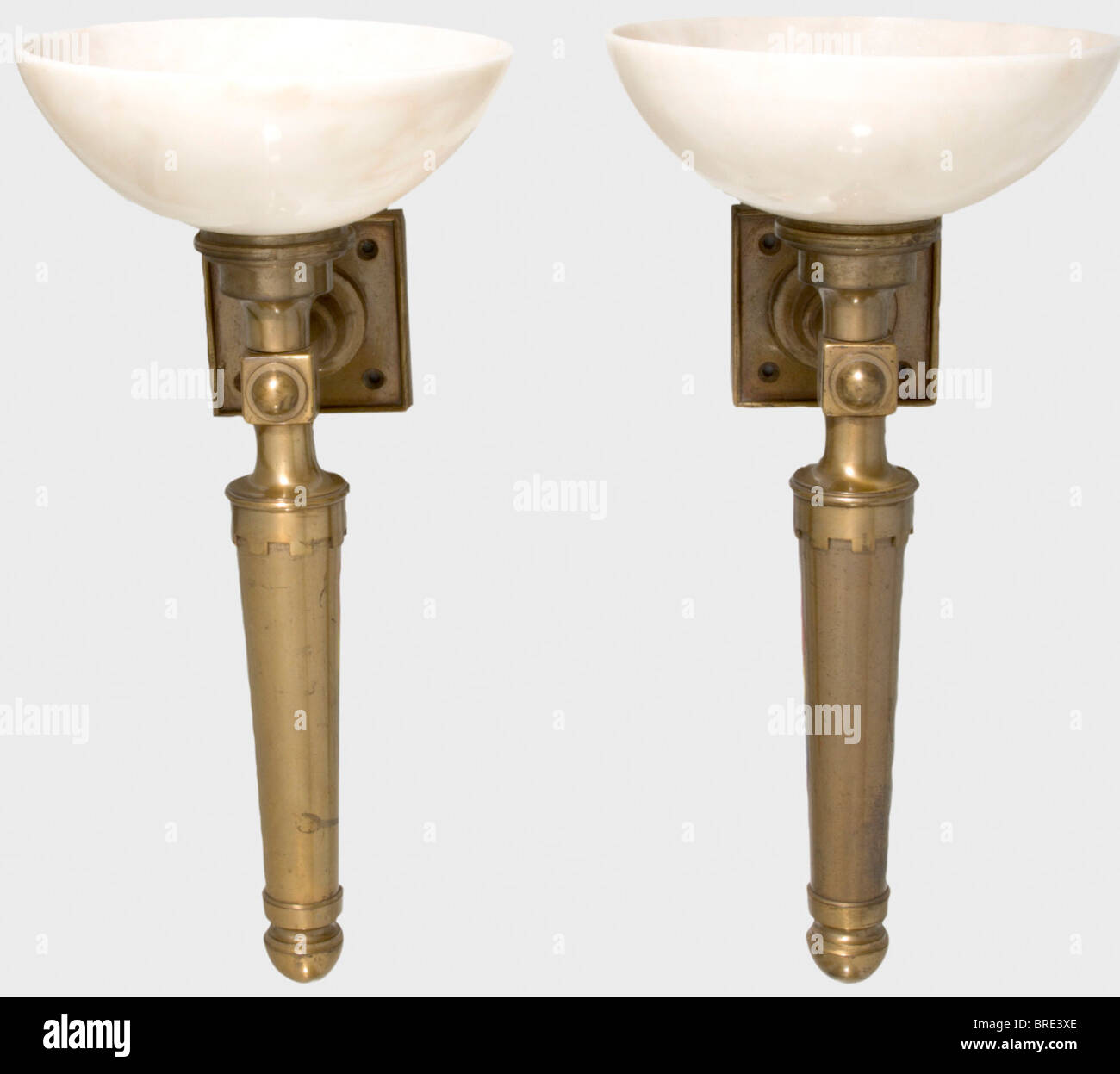 Adolf Hitler, two wall candelabra from the drawing room in the Führerhaus in Munich Created and designed by Professor Leonhard Gall and Prof. Gerdy Troost. Brass, with gold-coloured electroplating. The lampshades are made of figured, light marble. The wiring has been replaced. Hitler had the original fabric lampshades replaced by the marble shades for their effect, as in the large reception hall and in the dinning room. Height: 53 cm. The Führerhaus and NSDAP administration building were built on the Königplatz in Munich from plans by the Munich architect Paul , Stock Photo
