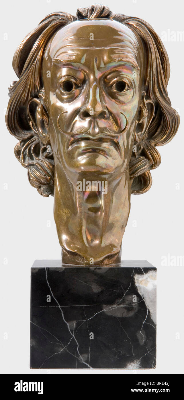 Arno Breker (1900 - 1991), a portrait head of Salvador Dali Gilt bronze with black streaked marble base. On the left side of the neck the artist's signature and date 'Arno Breker 1974 - 75', on the back foundry stamp 'Venturi Arte' and edition number '132' (199 copies were produced in total). Height of the bronze head 21 cm, with base 29 cm. Very impressive, finely modelled head. people, 1970s, 20th century, fine arts, art, NS, National Socialism, Nazism, Third Reich, German Reich, Germany, National Socialist, Nazi, Nazi period, object, objects, stills, clippin, Stock Photo
