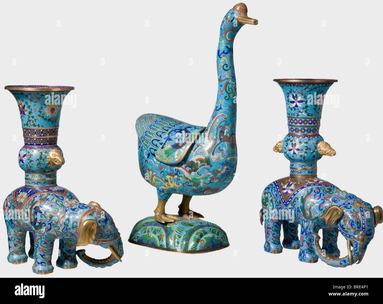 Princess Elsa of Württemberg (1876 - 1936), a Chinese champlevé goose and two elephants from the Asian room, circa 1900 Gilded bronze richly decorated with enamel. Made in several pieces. An inventory label, 'P.E. v.W. Privat Eigentum' (Personal property), for Princess Elsa of Württemberg, on the bottom of each piece. Height of the goose 66.5 cm. Heights of the elephants 45 and 47 cm. historic, historical, 1900s, 20th century, 19th century, vessel, vessels, object, objects, stills, clipping, clippings, cut out, cut-out, cut-outs, Stock Photo