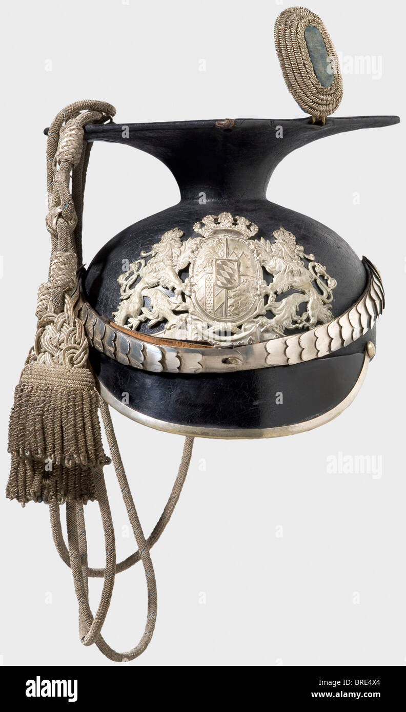 A model 1886 czapka for officers, 2nd Uhlan Regiment König Black-laquered  leather skull, coat of arms in frosted silver plating, silvered chinscales,  officer's field insignia, without Reichskokarde (because before 1897). Red  brown