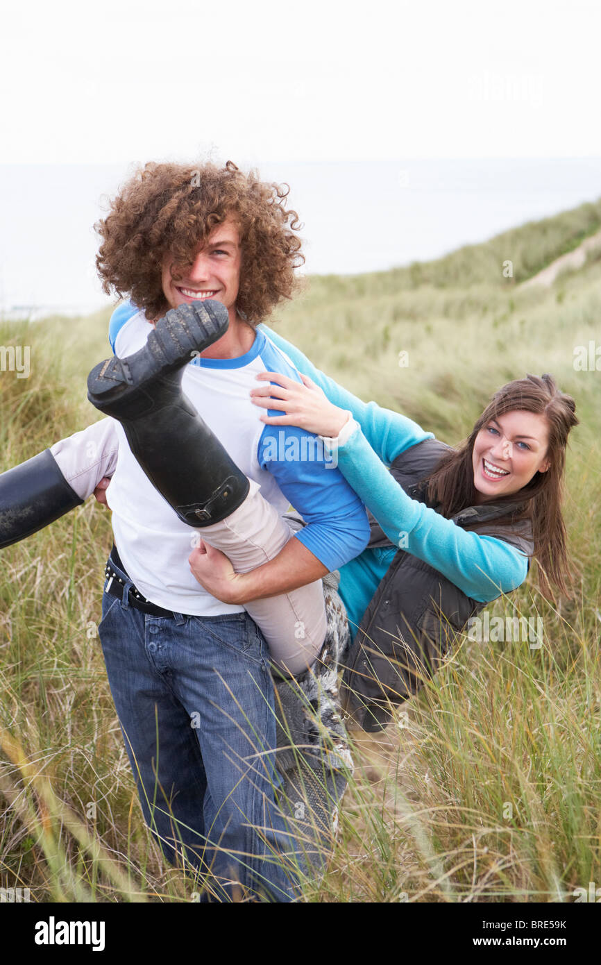 Piggy back ride beach hi-res stock photography and images - Alamy