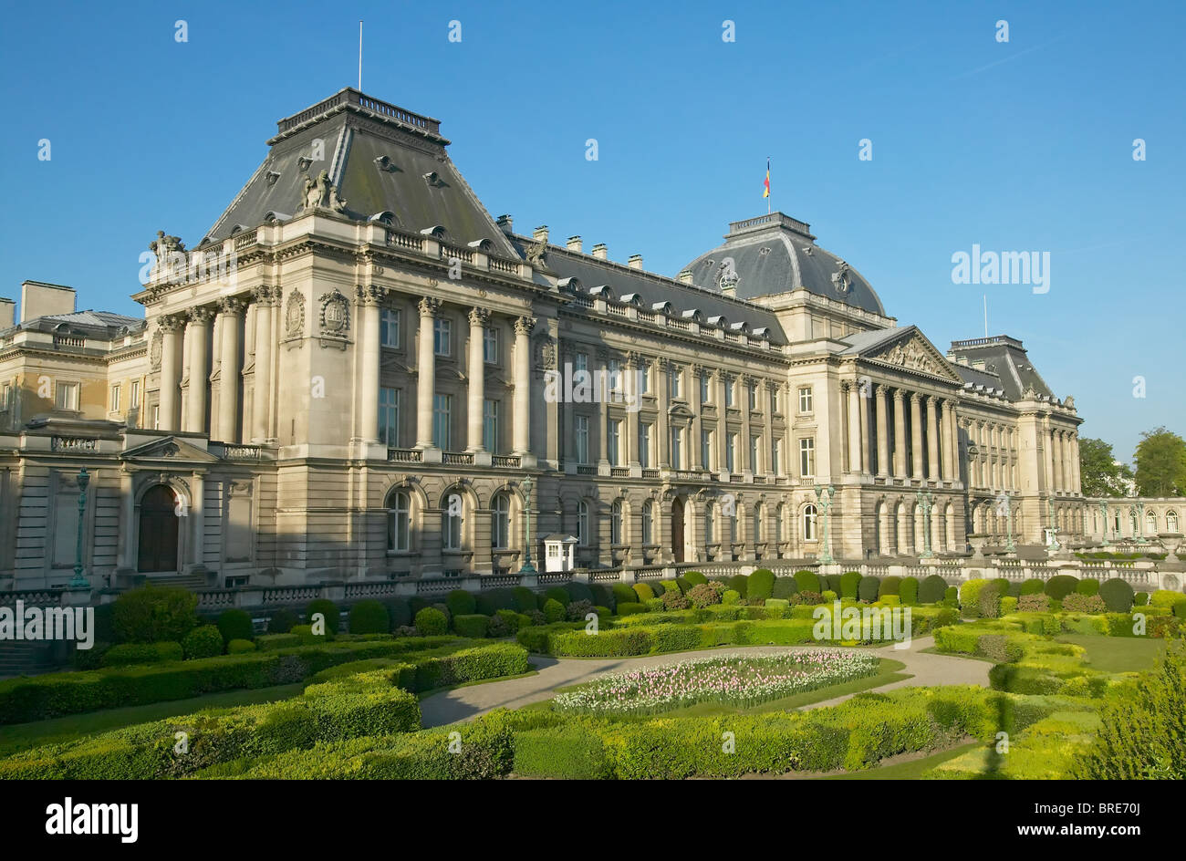 The front facade and formal gardens of the neo-classical Palais de la Nation (National Palace) in Upper Town, Brussels, Belgium Stock Photo