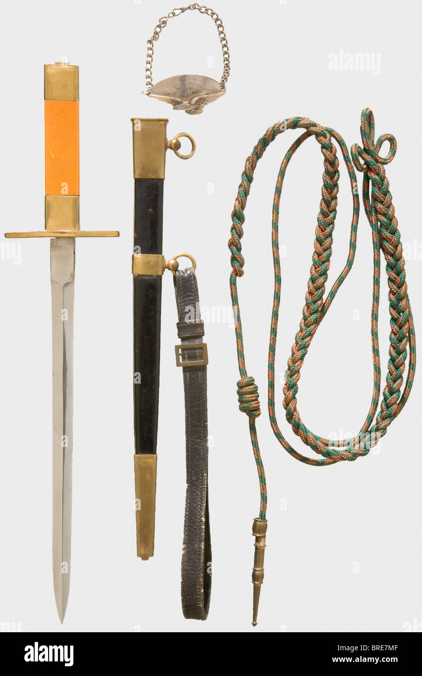 Armand Pinsard (1887 - 1953), a flyer's dagger, identity bracelet, lanyard of the Medaille Militaire Dagger for aviation officers. Chromed blade, maker's mark 'P. Four, Paris' on the ricasso. Yellow plastic grip with gilt parts. Black leather scabbard with gilt brass fittings. A section of the hanger is missing. Length 37.5 cm. Bracelet with identity disc. Silver oval plaque, on the lower edge an eagle in flight (Bijou-Fix) above which is engraved 'ESCADRILLE 78' and the Panther ('Léopard of Bornéo') squadron marking which was originally the personal mark of Pi, Stock Photo