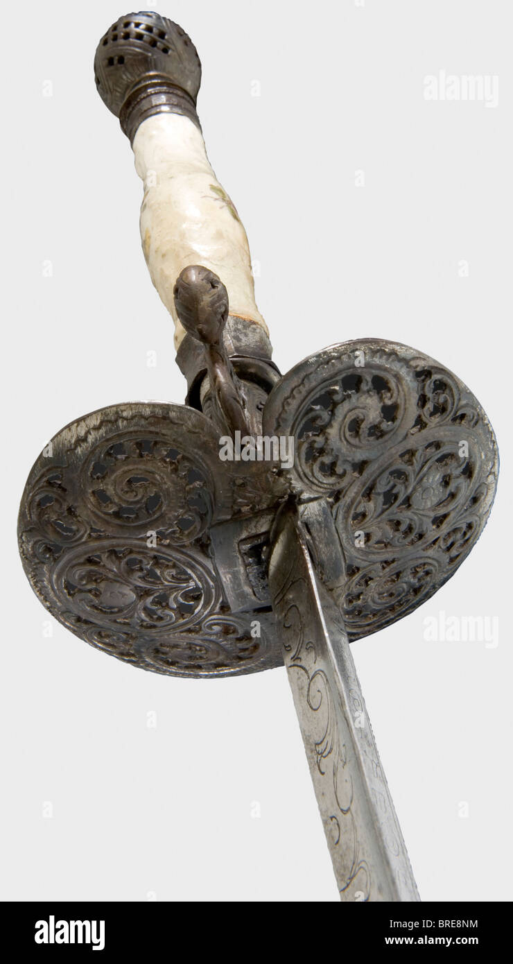 A French small-sword with a porcelain grip, circa 1780 A Colichemarde blade engraved with scroll work and with an illegible motto on the reverse side. Openwork, chiselled iron hilt with a porcelain grip. Blade somewhat stained, grip repaired, one grip ferrule replaced. Length 96 cm. historic, historical, 18th century, dress sword, swords, thrusting, thrustings, smallsword, epee de cour, weapon, arms, weapons, arms, military, militaria, object, objects, stills, clipping, clippings, cut out, cut-out, cut-outs, Stock Photo