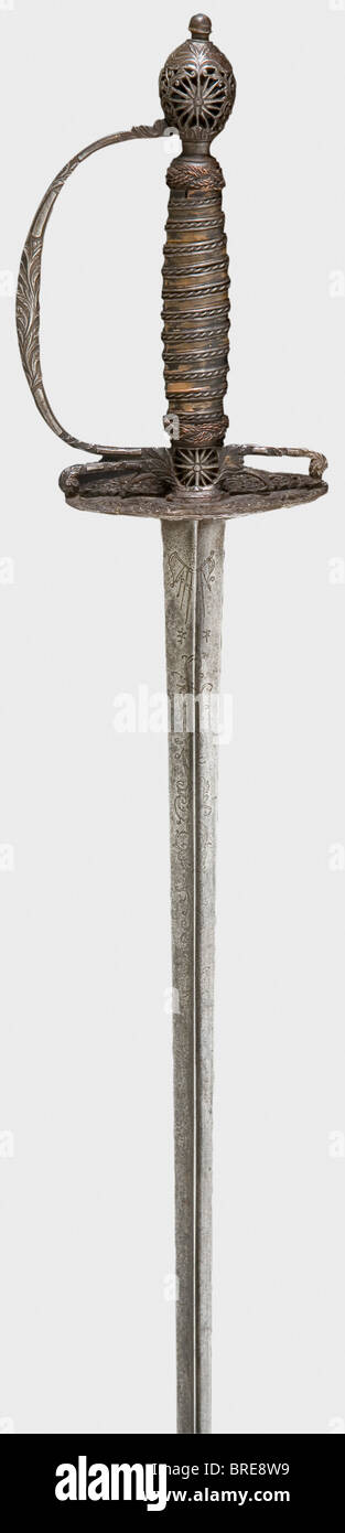 An English small-sword, end of the 18th century A triangular blade engraved with scroll work. Delicate openwork, chiselled iron hilt. Grip wrapping of iron and copper wire with Turk's heads. Iron pieces show some patina. Length 95 cm. historic, historical, 18th century, dress sword, swords, thrusting, thrustings, smallsword, epee de cour, weapon, arms, weapons, arms, military, militaria, object, objects, stills, clipping, clippings, cut out, cut-out, cut-outs, Stock Photo