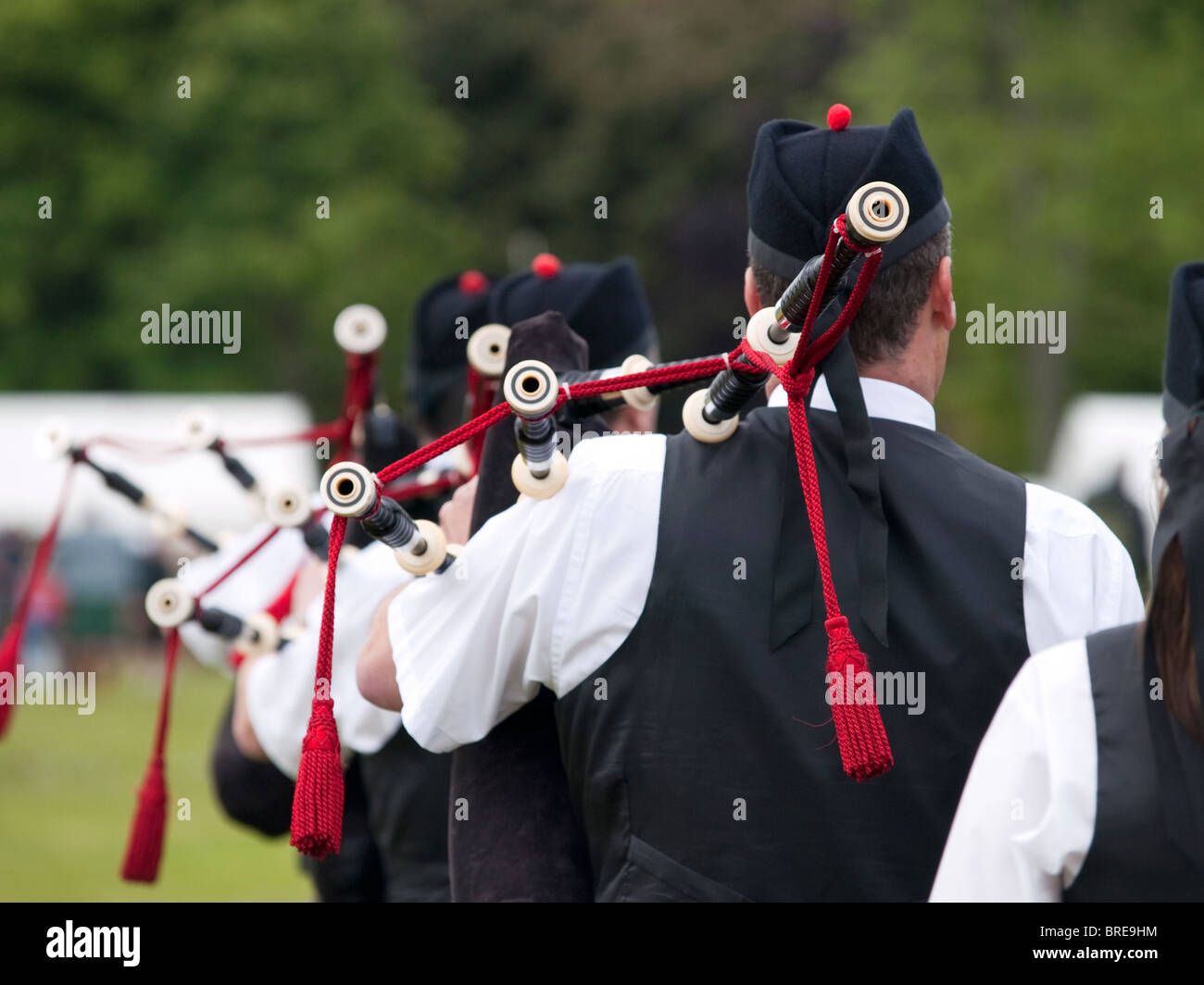 Pipers in a pipe band at a Highland Games event in Scotland Stock Photo