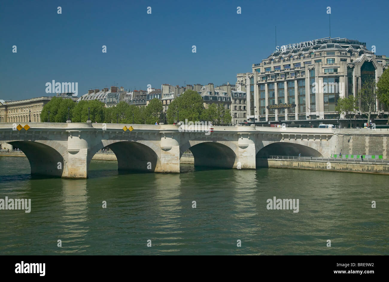Pont Neuf (New Bridge) bridging the Seine river and the Samaritaine department store, Paris France Stock Photo