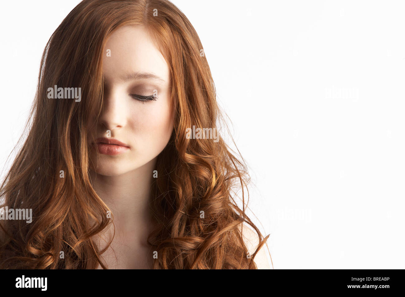 Portrait Of Attractive Teenage Girl In Studio Stock Photo - Alamy