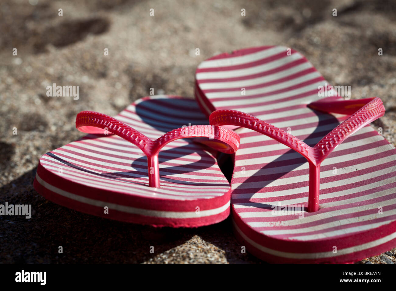 flip flops on the beach Stock Photo - Alamy
