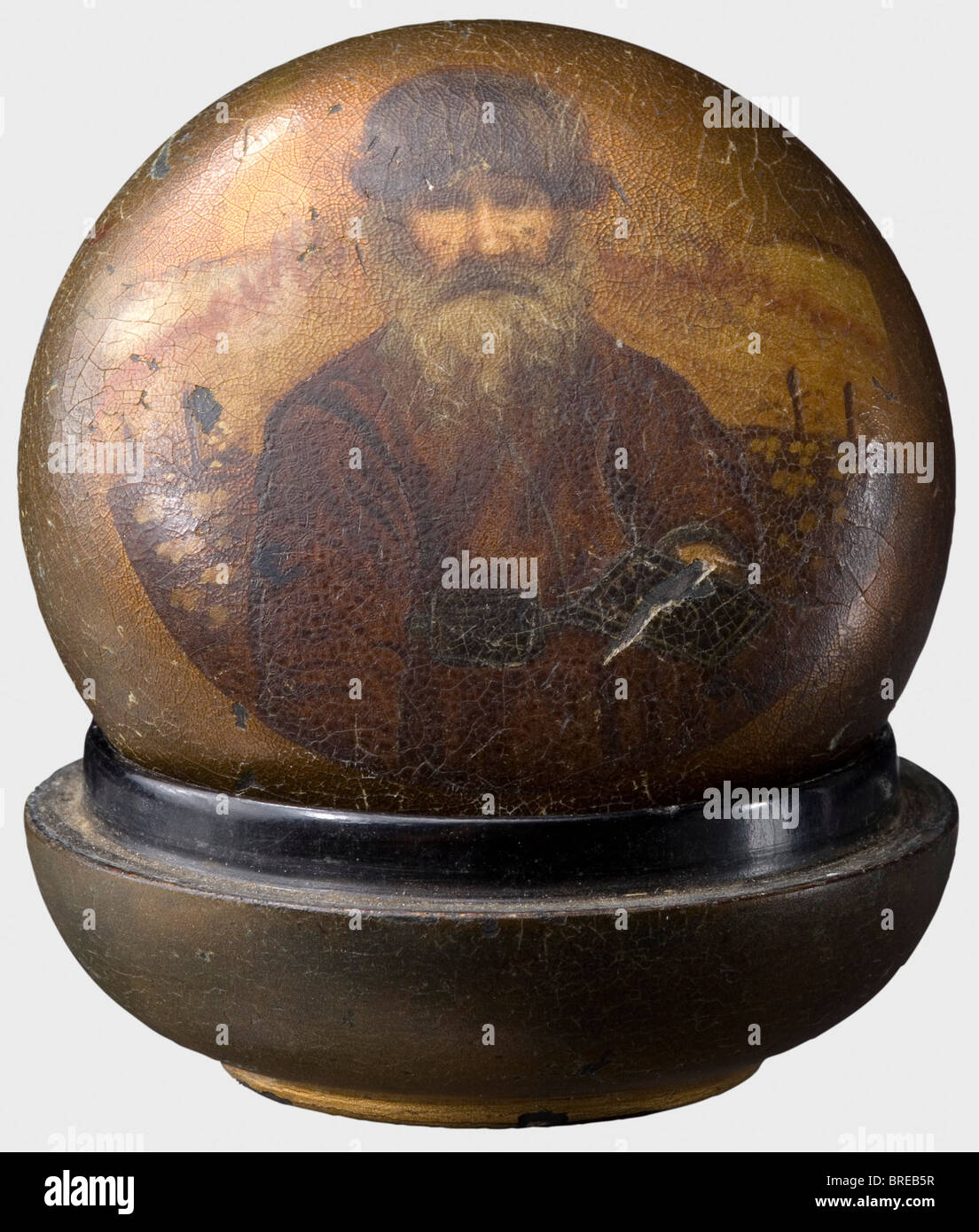 A small lacquered case bearing the portrait of a peasant, Court Purveyor Lukutin, Moscow Black and gold lacquer. Maker's signature, 'Lukutin' under a Russian double eagle inside the lid. Diameter 6 cm. Provenance: Grand Duchess Vera Konstantinovna Romanova (1854 - 1912). historic, historical, people, 19th century, vessel, vessels, object, objects, stills, clipping, clippings, cut out, cut-out, cut-outs, Stock Photo