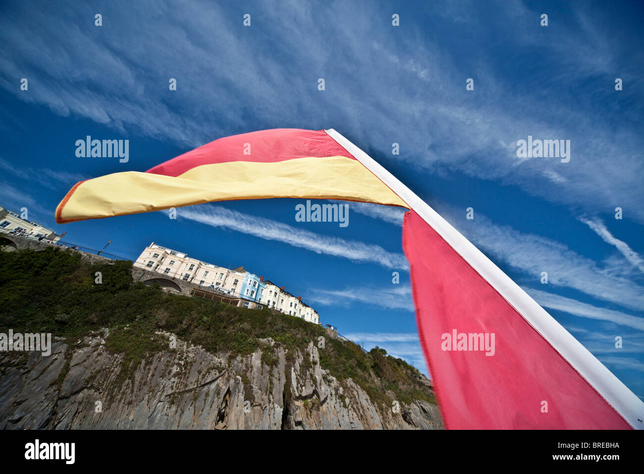 Bathing warning flag and hotels in Tenby Stock Photo